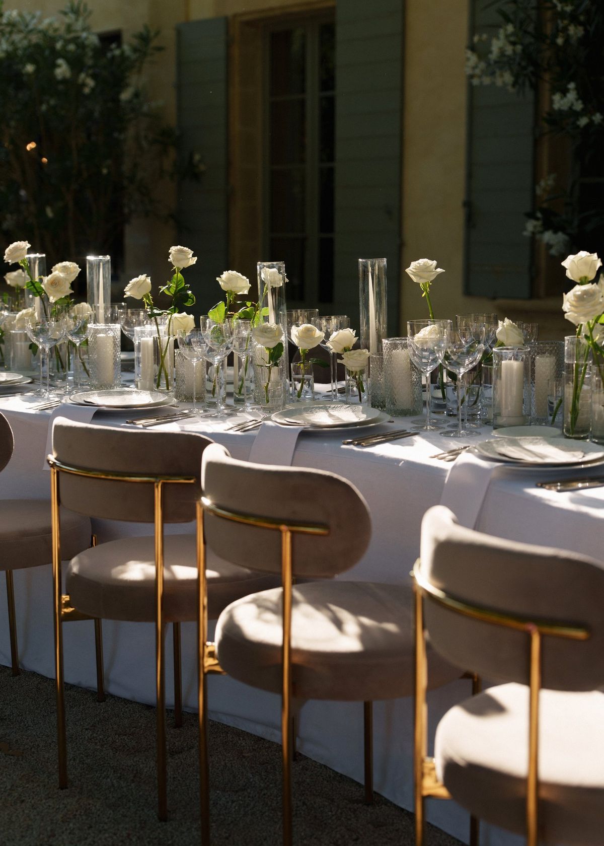 Reception table setting with fresh floral arrangement