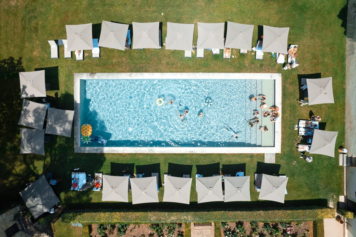 Aerial view of the swimming pool and sun loungers