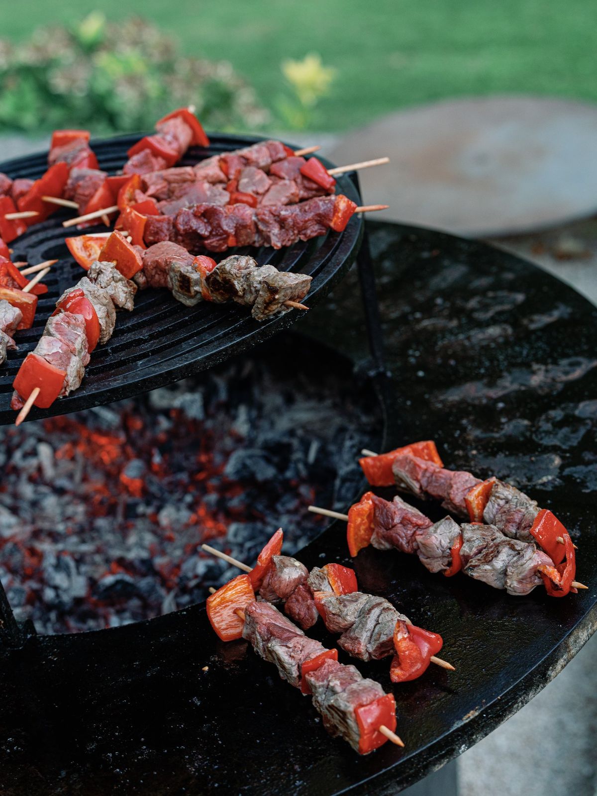 Skewers grilling over an open flame
