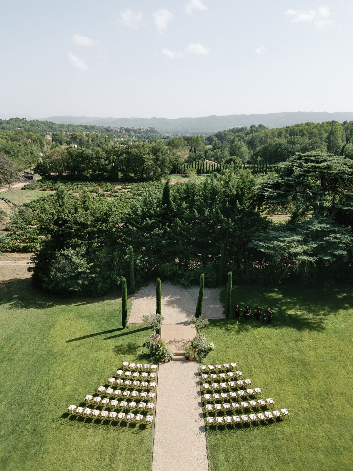 Aerial view of an empty ceremony setup on the lawn