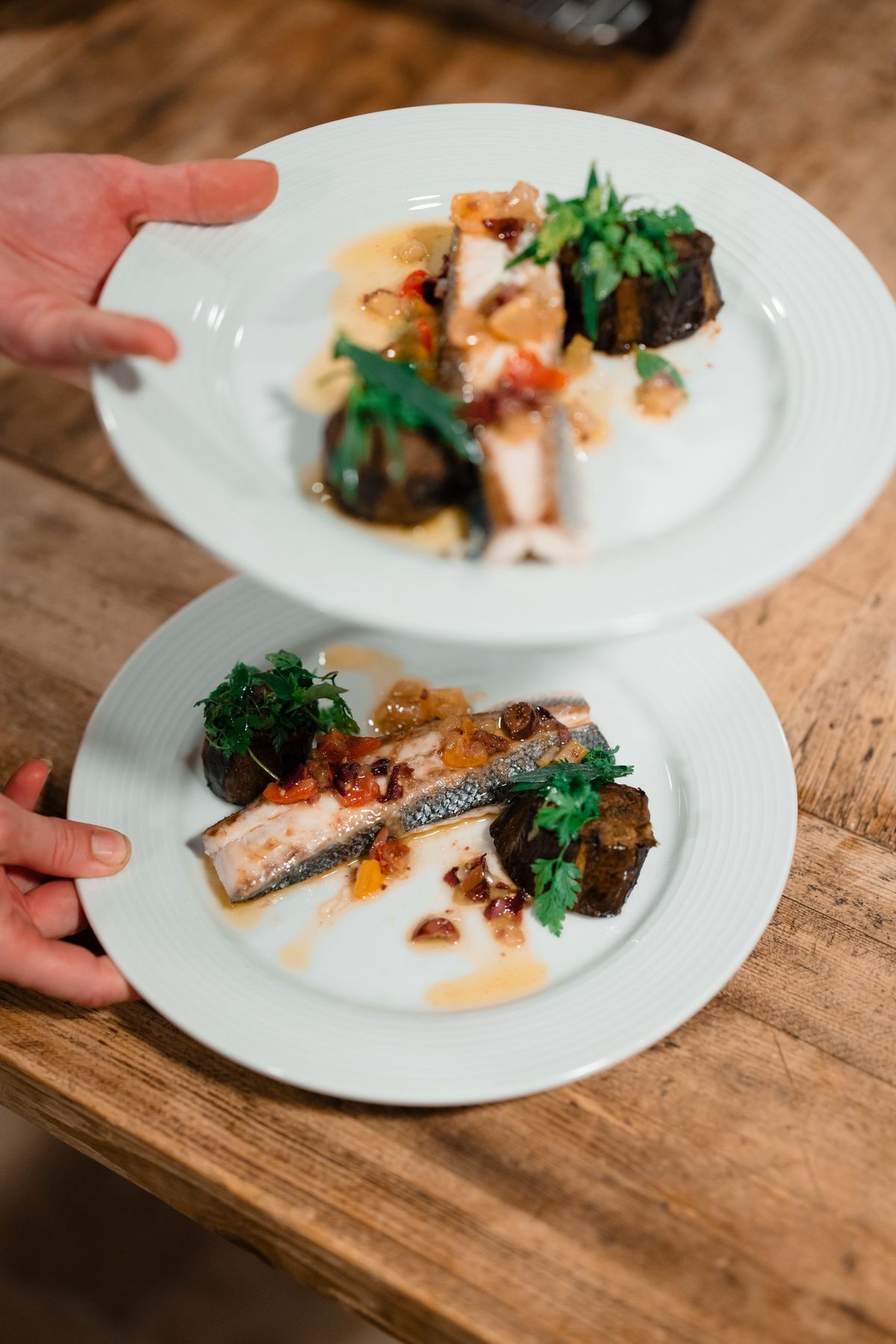 Plated dinner course held for service