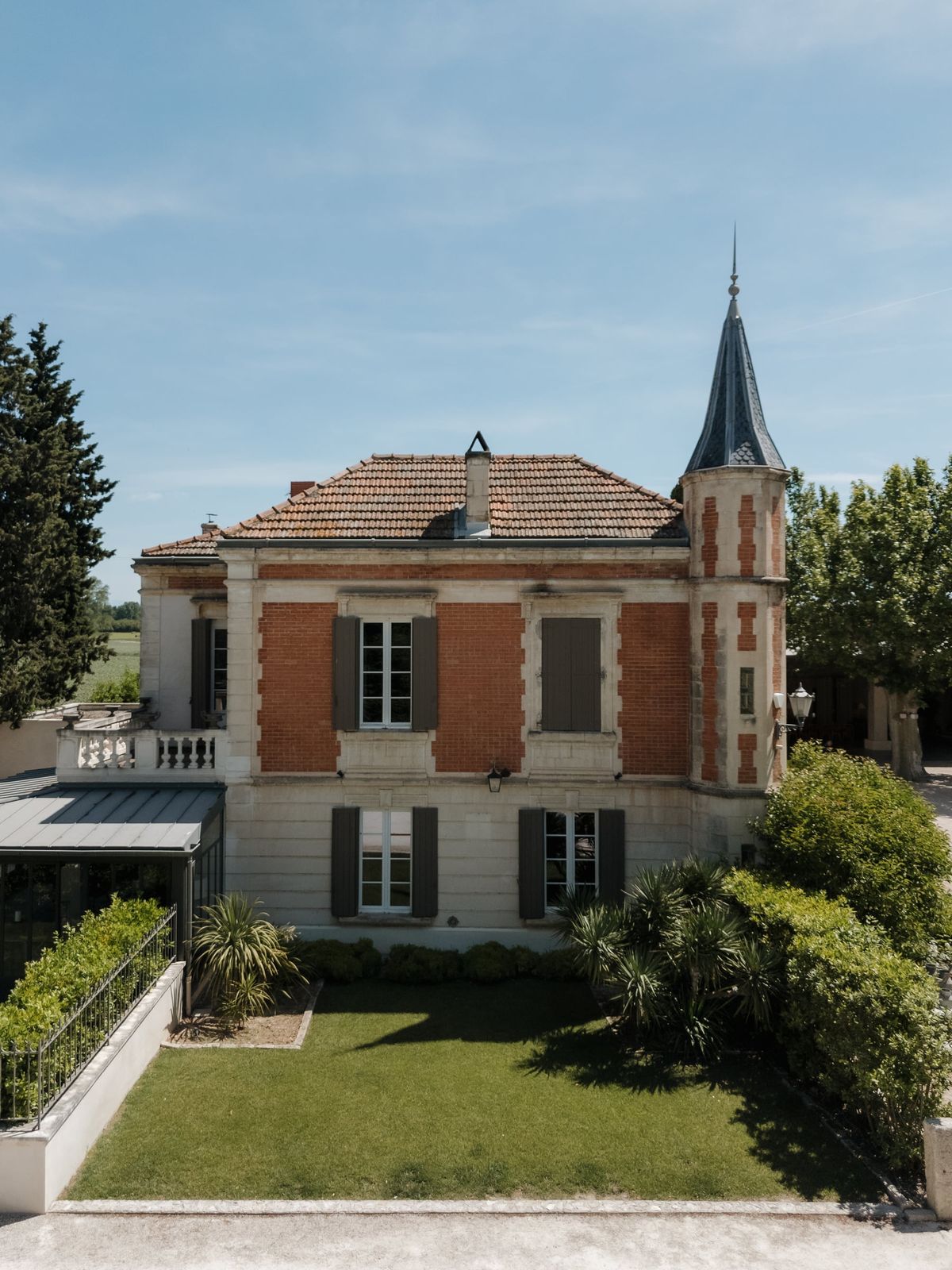 Mas D'Arvieux Provencal chateau facade with corner turret and gardens