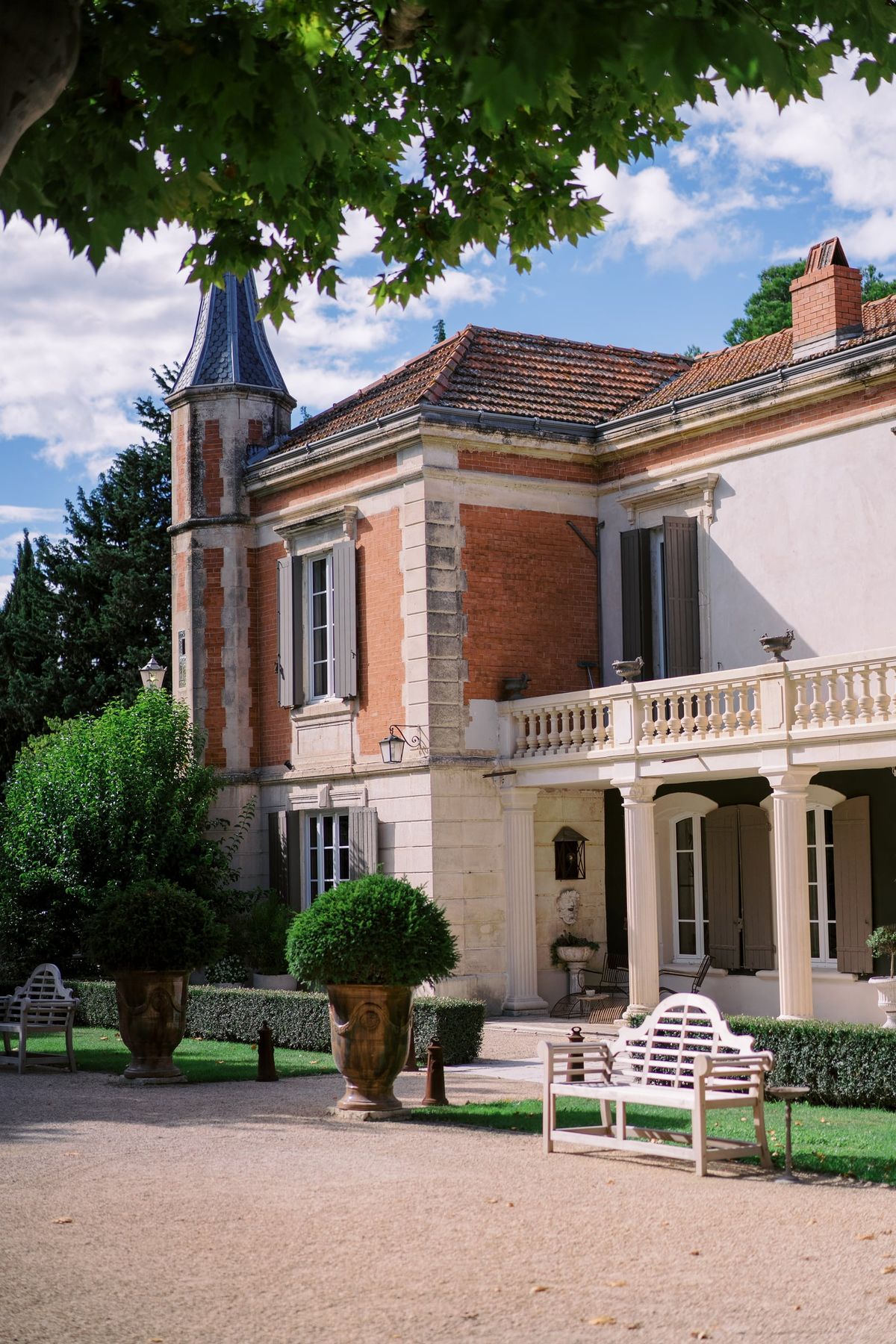 Mas D'Arvieux reflecting pool and covered terrace beside the chateau