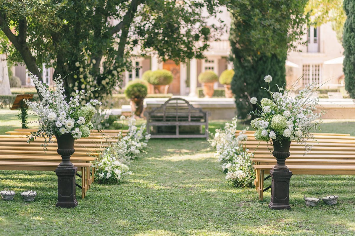 Mas D'Arvieux gravel courtyard set for an outdoor wedding ceremony