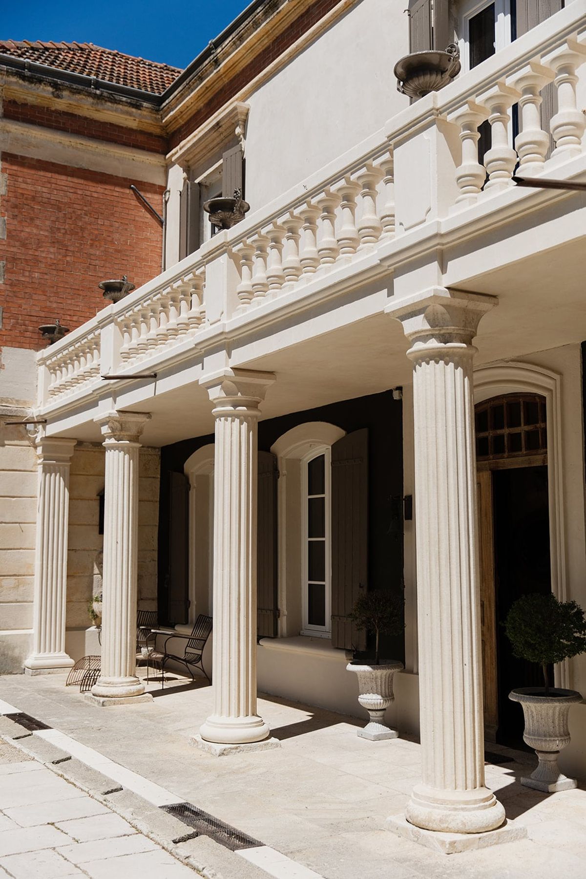 Mas D'Arvieux colonnade terrace with fluted stone columns