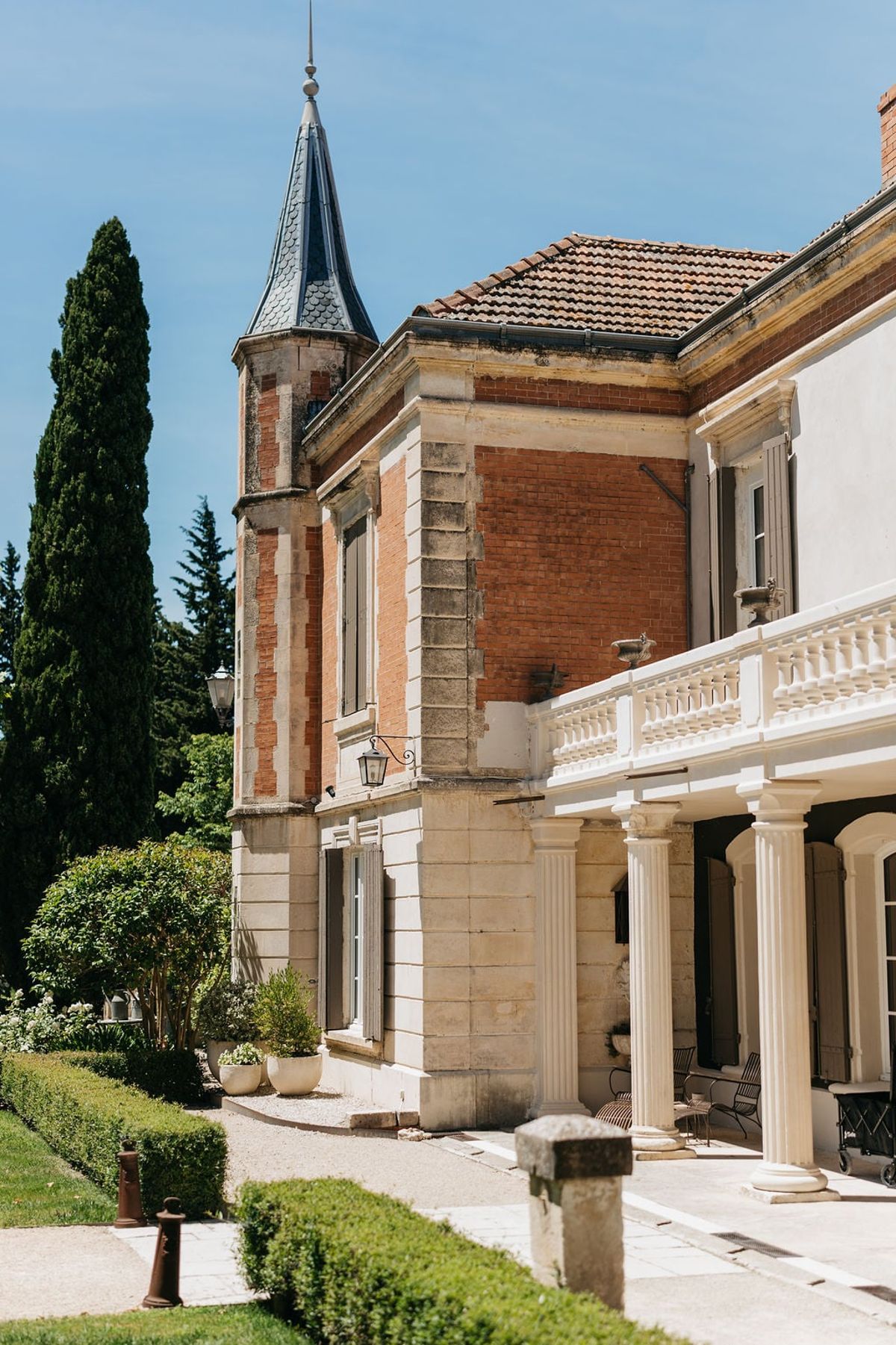 Mas D'Arvieux corner turret and brick facade detail