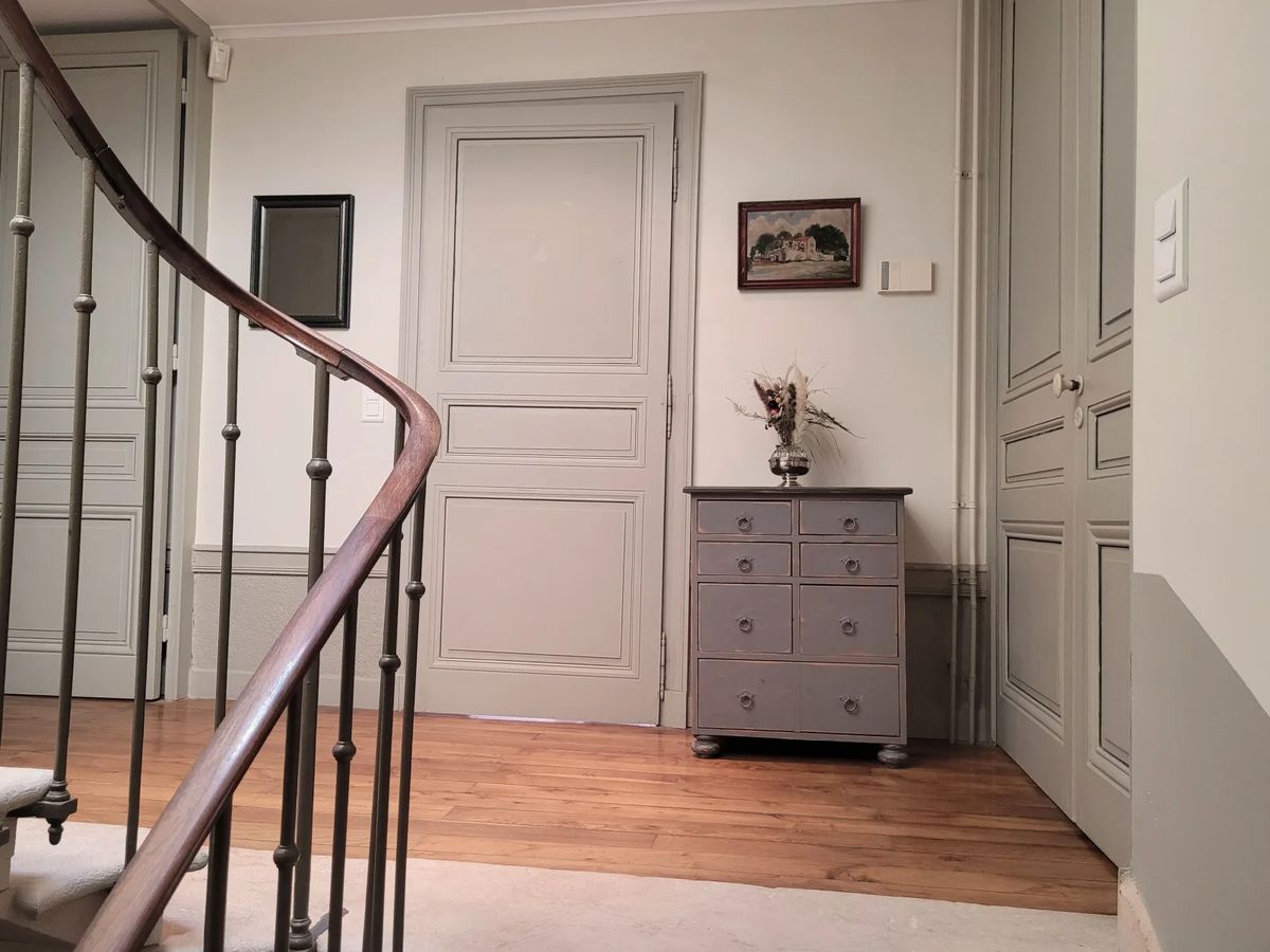 Wooden staircase and hallway inside the maison de maitre at Domaine de Vavril