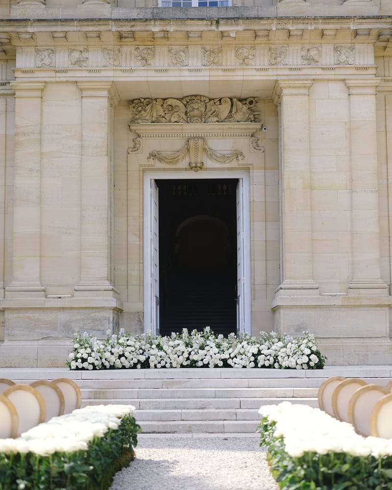 Ceremony setup at chateau entrance at Chateau Saint-Martin-du-Tertre
