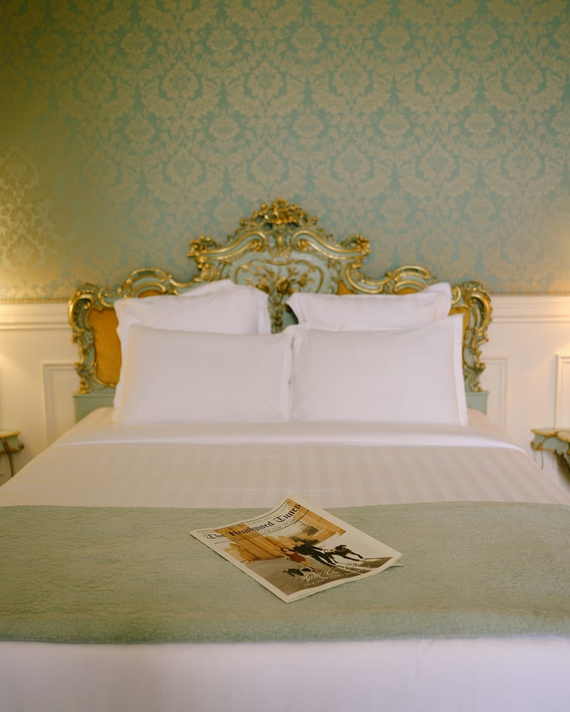 Gilt rococo bed in bridal suite at Chateau Saint-Martin-du-Tertre