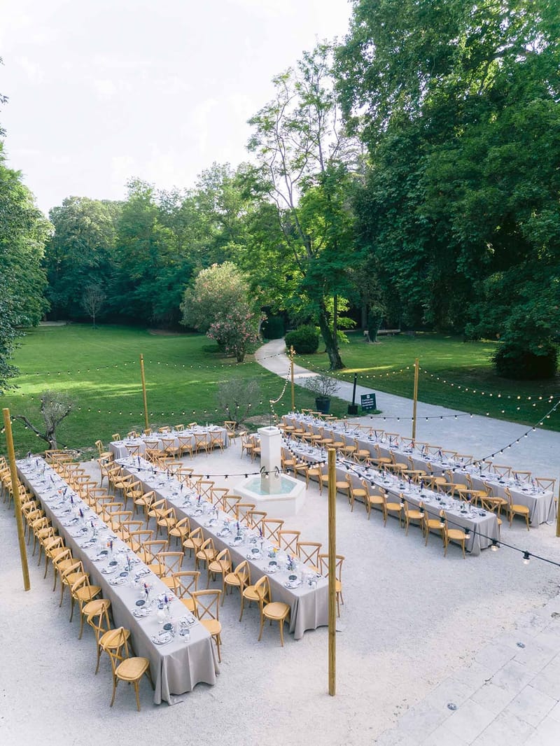 Aerial of courtyard reception around fountain at Chateau des Barrenques Provence