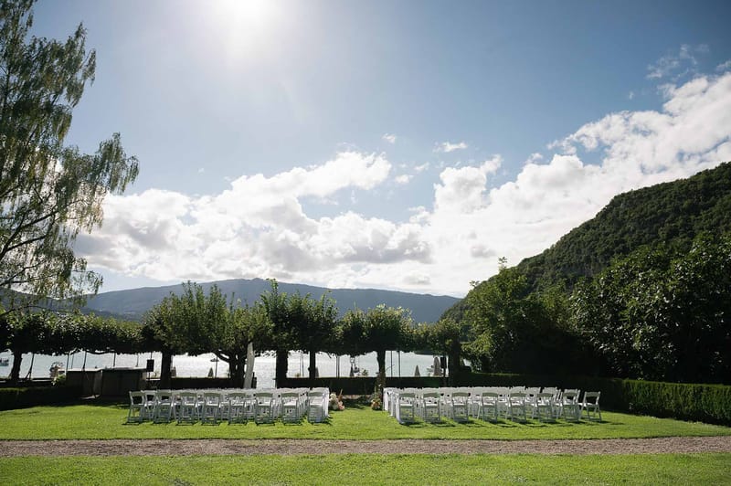 Ceremony lawn with lake and Alpine mountain panorama at Abbaye de Talloires