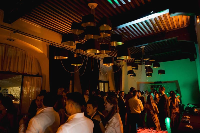 Vintage chandelier in vaulted stone reception room at Abbaye de Talloires