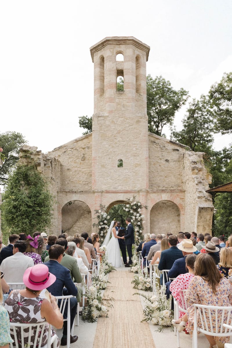 Wedding ceremony in a chapel with white roses
