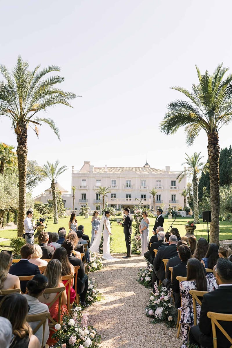 Wedding ceremony in a garden with white roses