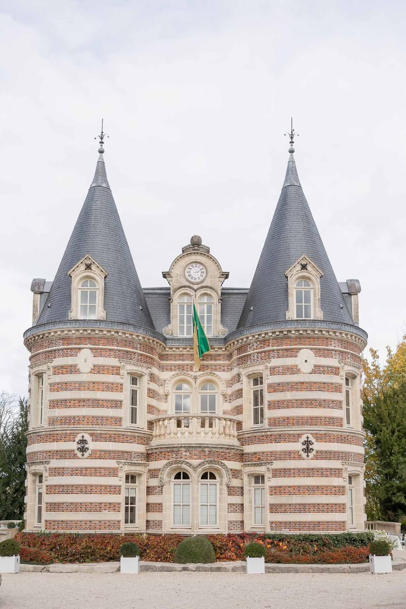 Front façade of Château Comtesse Lafond with twin turrets in Épernay