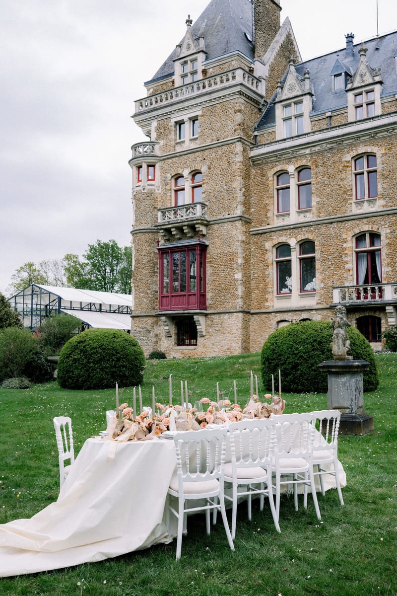Outdoor dining setup on lawn at Château de Méridon, Île-de-France
