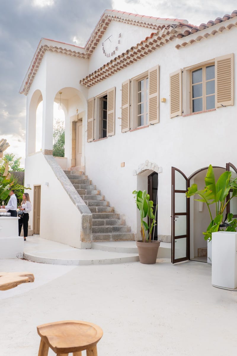 The white hotel exterior with its external staircase
