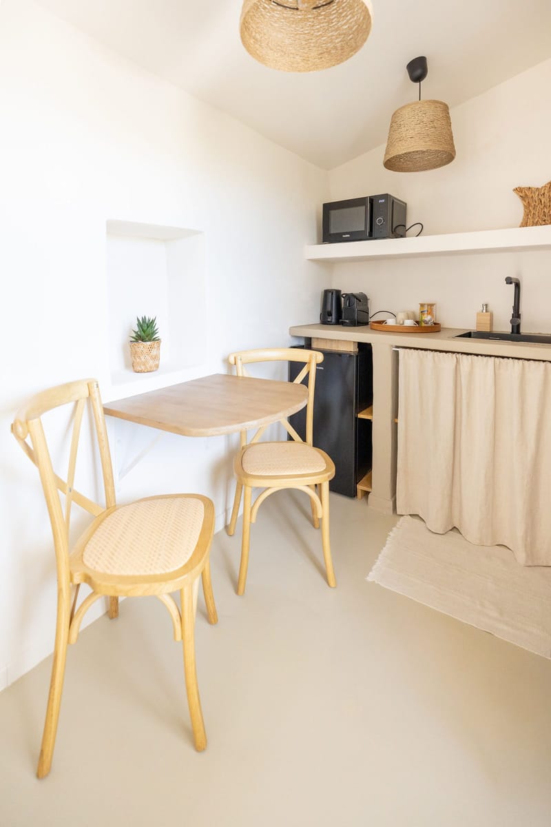 A bedroom kitchenette and dining nook