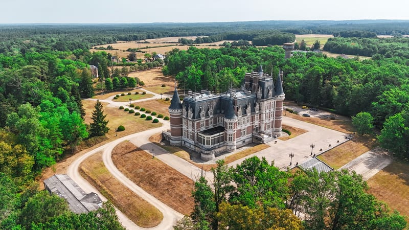 Aerial view of Château Changeux within the Foret Domaniale de Vouzeron