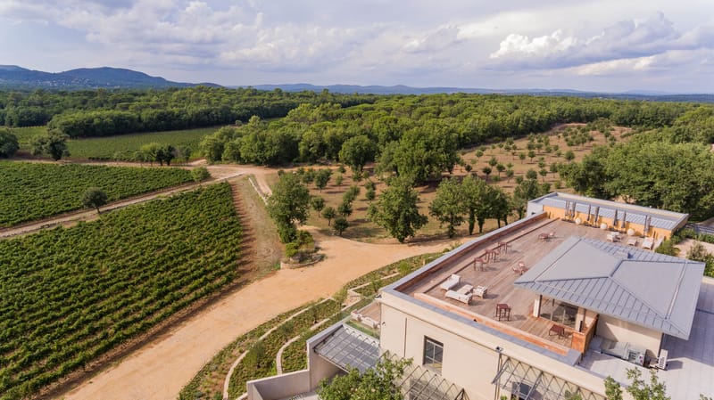 Aerial wide shot of Domaine de Blacailloux bastide and vineyards in Provence