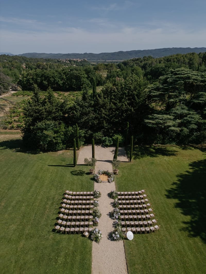 Aerial view of empty ceremony rows on the lawn