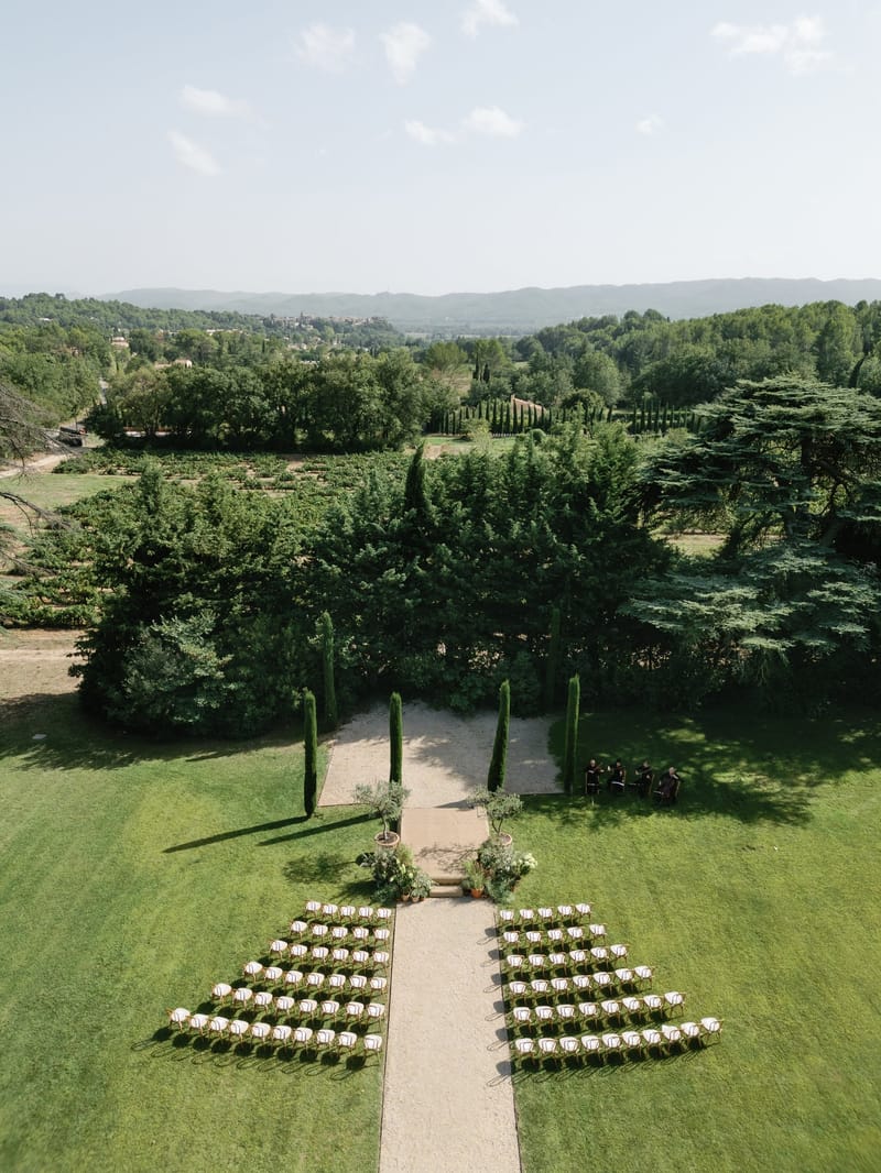 Aerial view of an empty ceremony setup on the lawn