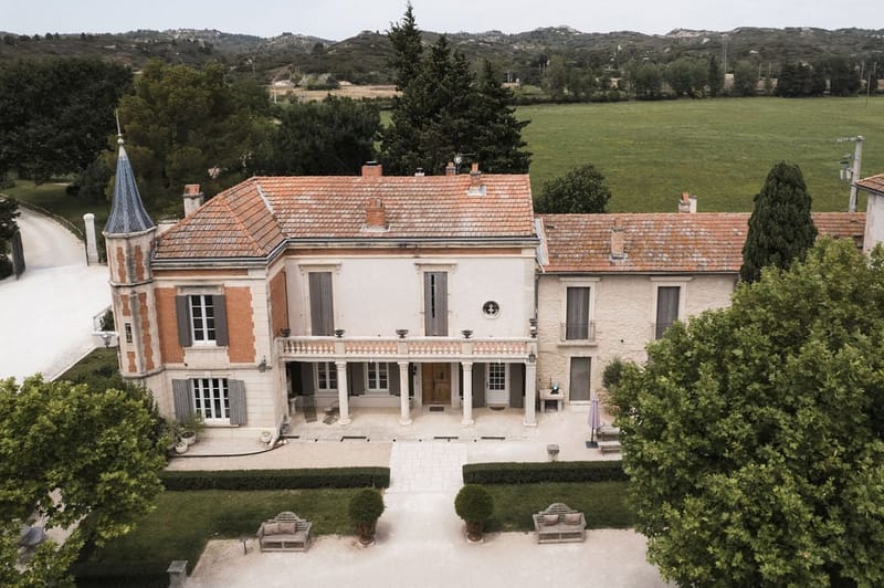Aerial view of Mas D'Arvieux chateau, turret and gardens in Provence