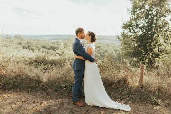 couple featuring bordeaux countryside