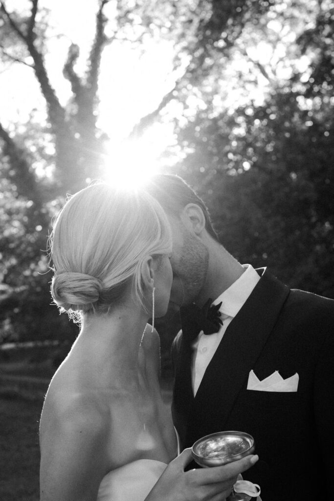 domaine de lamanon ivory romance roxane nicolas french wedding style bride groom kissing sunset black white picture