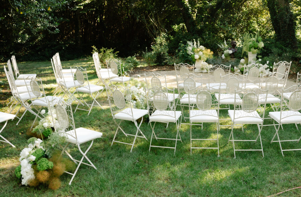 domaine de lamanon ivory romance roxane nicolas french wedding style ceremony chair oval arrangement white flowers garden