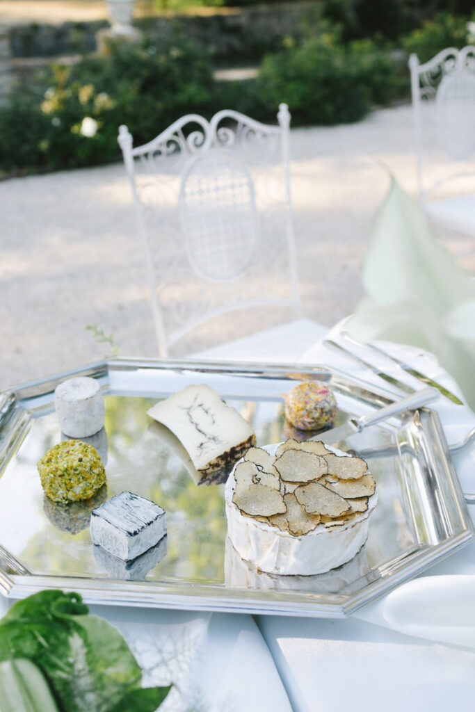 domaine de lamanon ivory romance roxane nicolas french wedding style food in silver tray reception white chairs