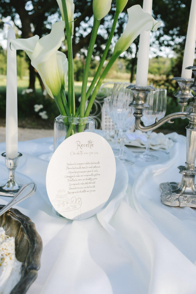 domaine de lamanon ivory romance roxane nicolas french wedding style unique table number reception white tulips silverware candle