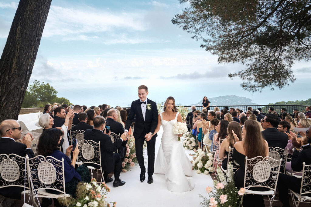 domaine du mont leuze vadim fasij french wedding style bride groom walking white flower aisle