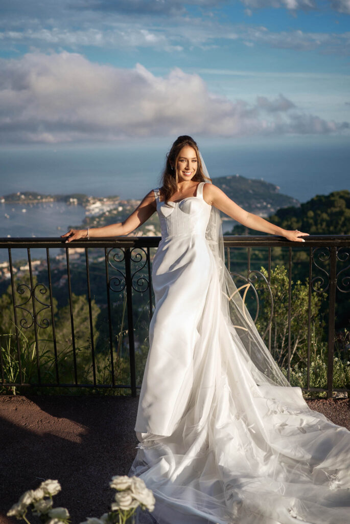 domaine du mont leuze vadim fasij french wedding style bride white dress sky ocean background