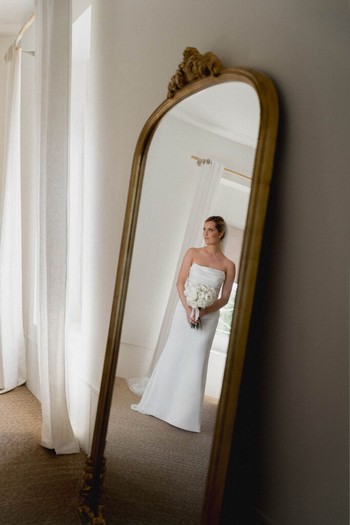 country gardens marjorie manfre french wedding style bride beauty shot mirror white dress bouqet