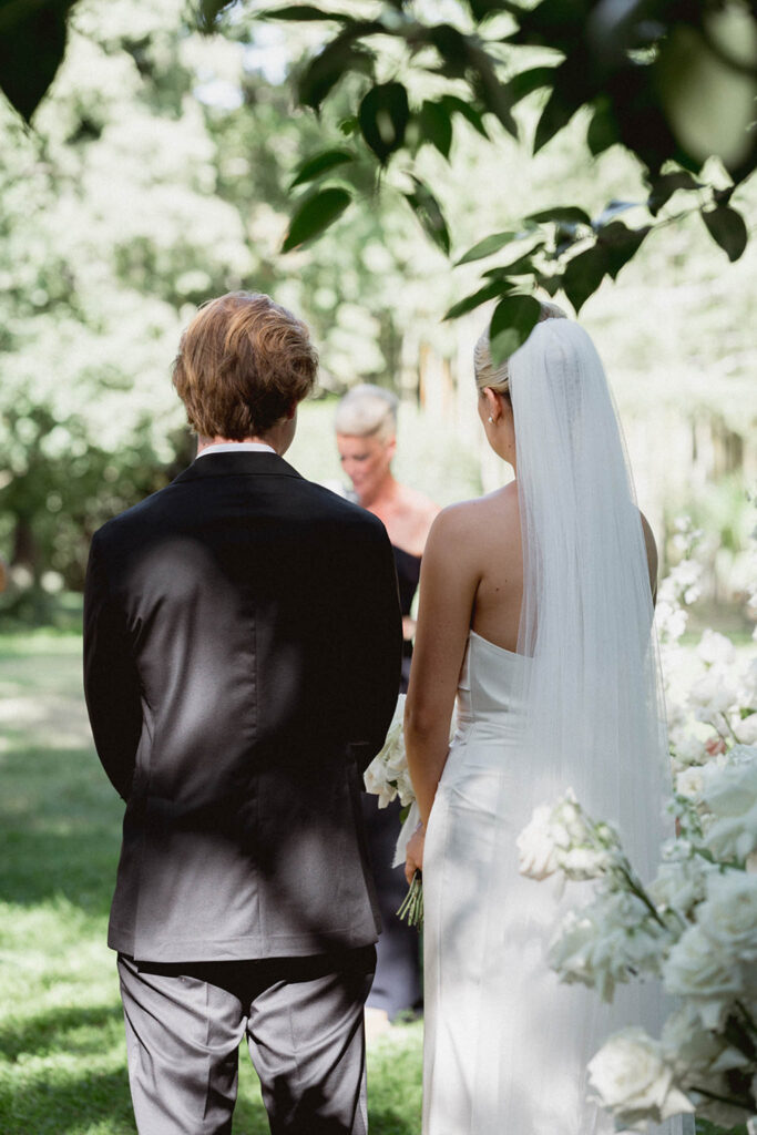 country gardens marjorie manfre french wedding style bride groom back shot veil tuxedo