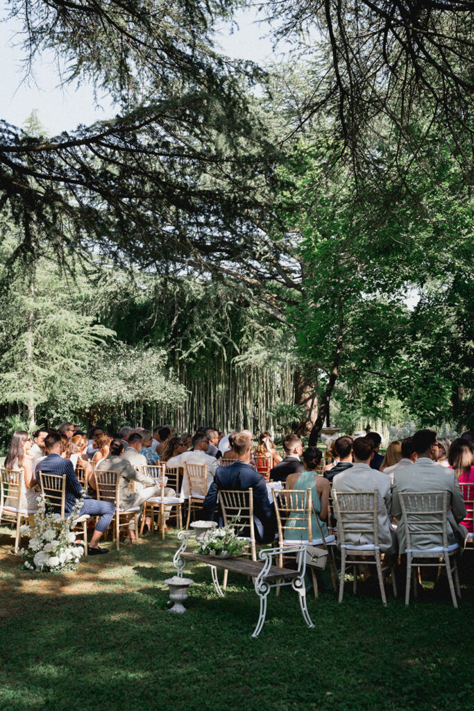 country gardens marjorie manfre french wedding style wedding guest sitting garden ceremony