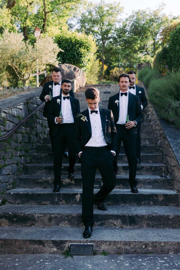 saint eusebe ayata groom groomsmen rock stairs