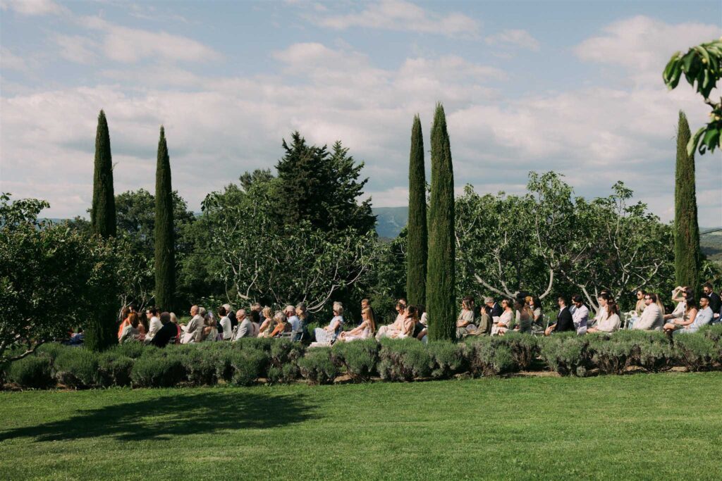 saint eusebe ayata sested guests ceremony long pine trees