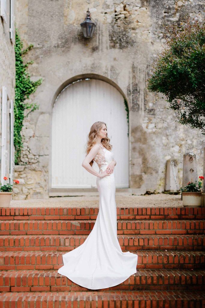 Trieux M.Mann bride brick stairs long mermaid trail