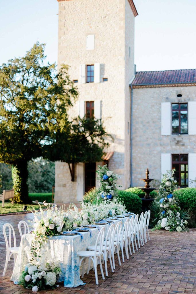 Trieux M.Mann long table reception outside manor