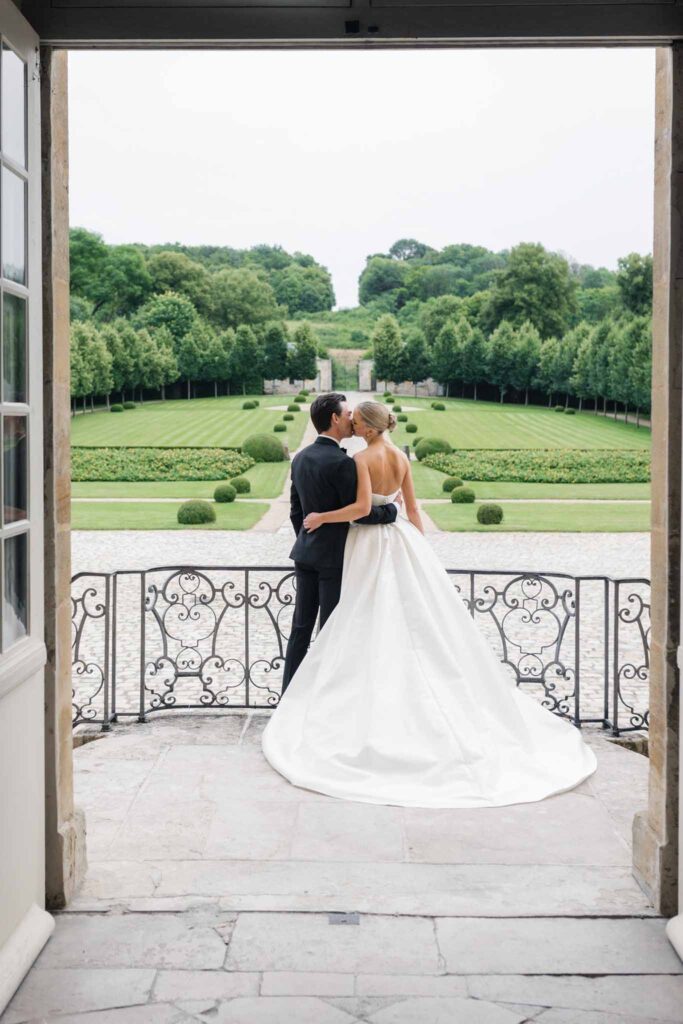 Villette Dream Paris Wedding bride groom kissing in patio