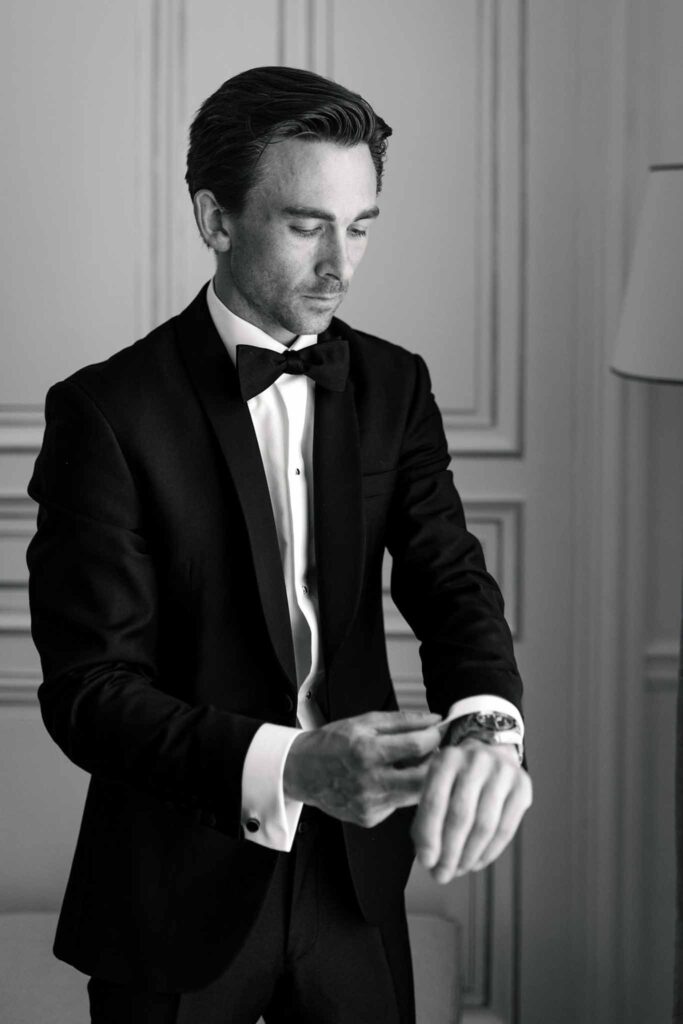 Villette Dream Paris Wedding groom fixing tuxedo black white photo