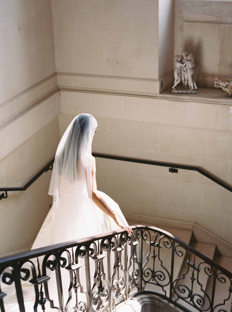 de Jalesne S.Lord bride walking down stairs