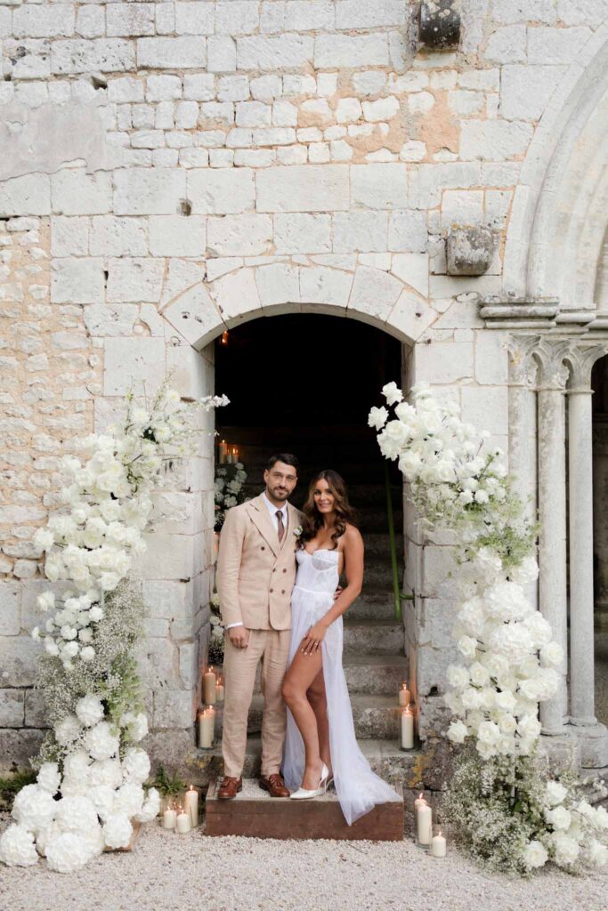 Abbaye Noce Machine bride high slit dress groom cream tux entrance reception