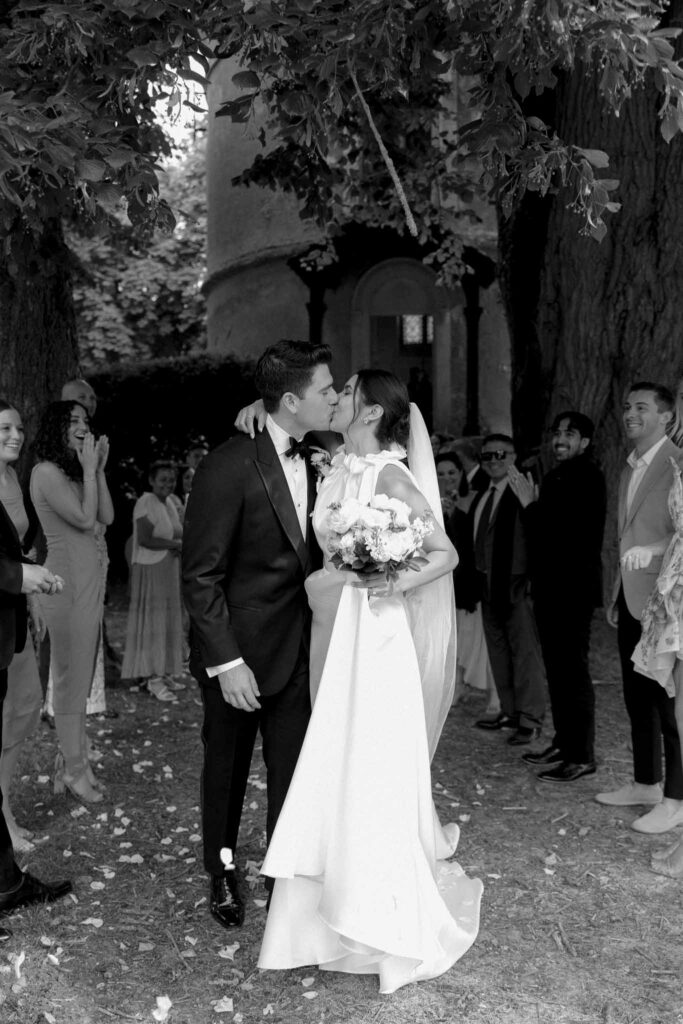 Boutonvillier F.Mary bride groom kissing guests background black white photo