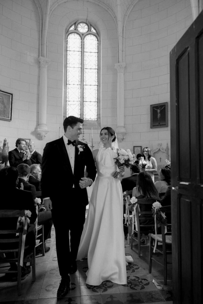 Boutonvillier F.Mary bride groom walking out of chapel after ceremony