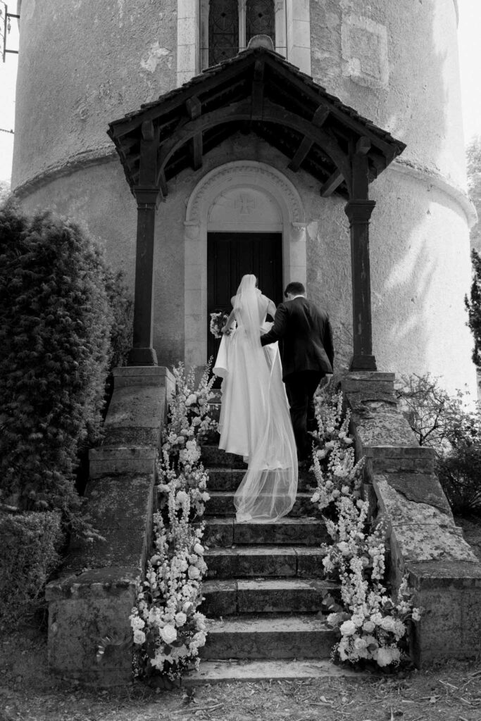 Boutonvillier F.Mary bride groom walking up stairs inside chapel black white photo