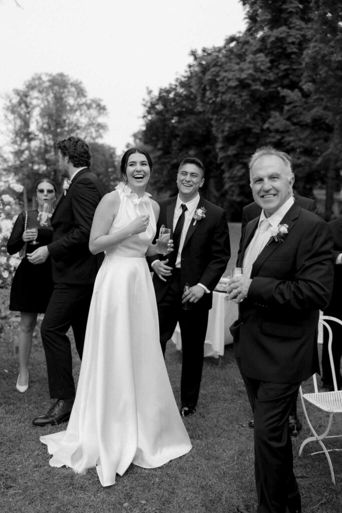 Boutonvillier F.Mary bride guests candid shot cocktail hour