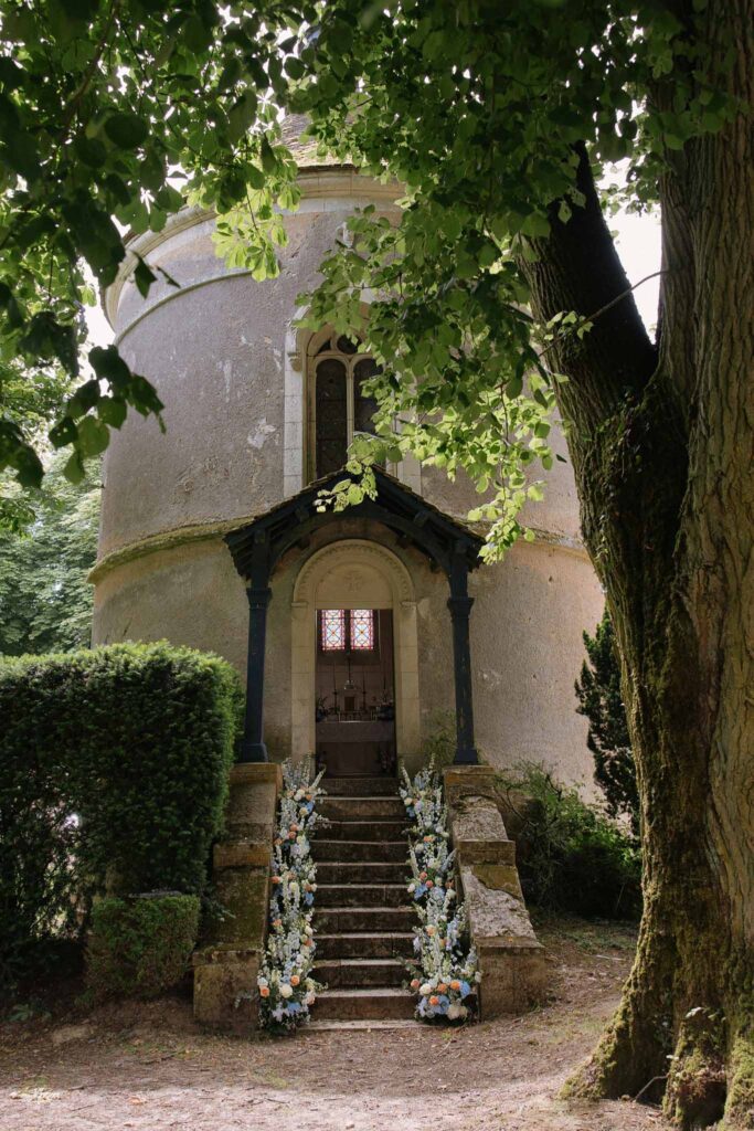 Boutonvillier F.Mary cylindrical tower stairs designed flowers large trees detail shot